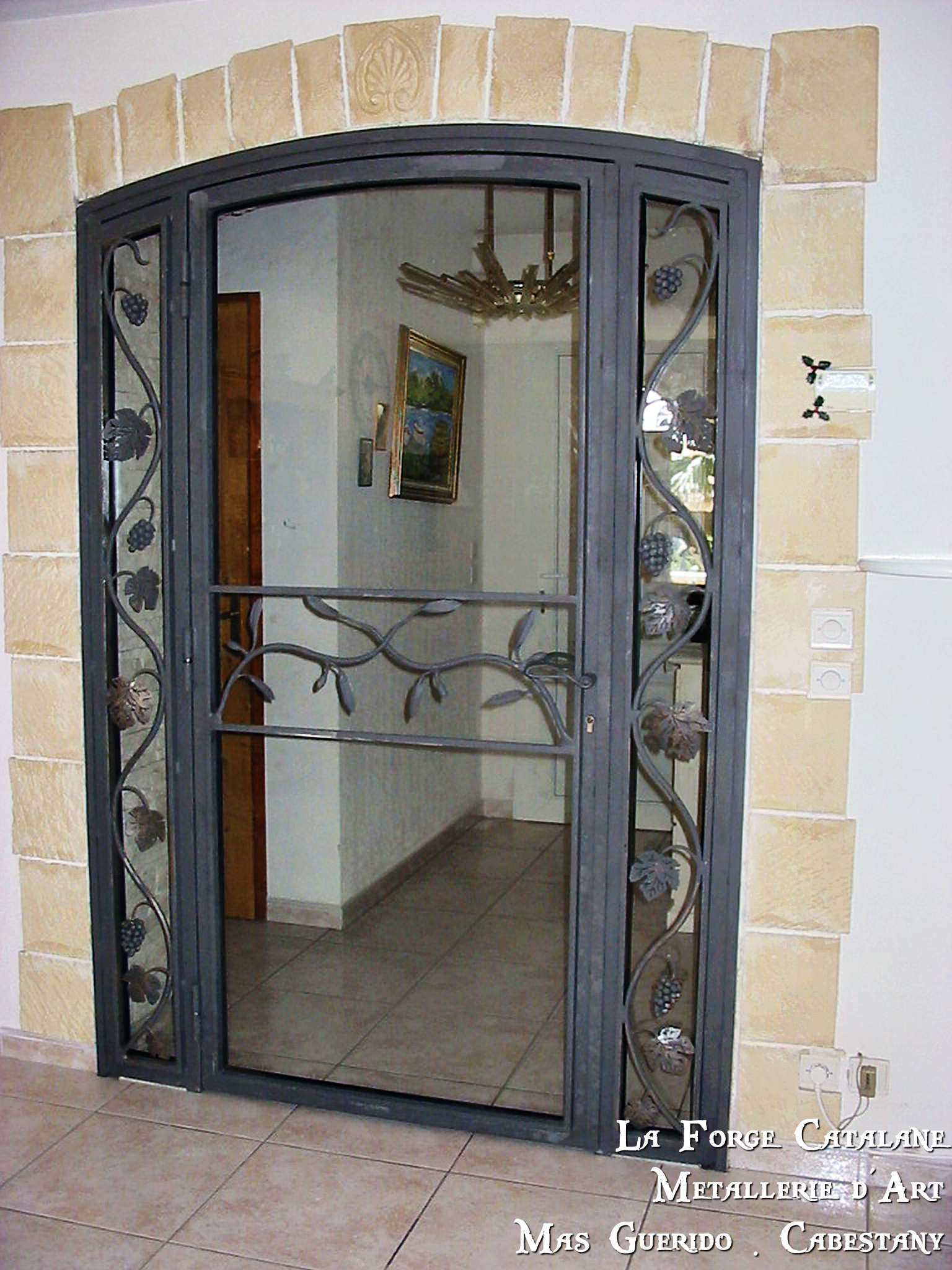 porte vitree cintree inspiration vegetale forge catalane 2.jpg